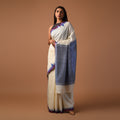 DESI KUMBHA Tussar/Cotton Handwoven Saree - Ivory Navy Blue Border